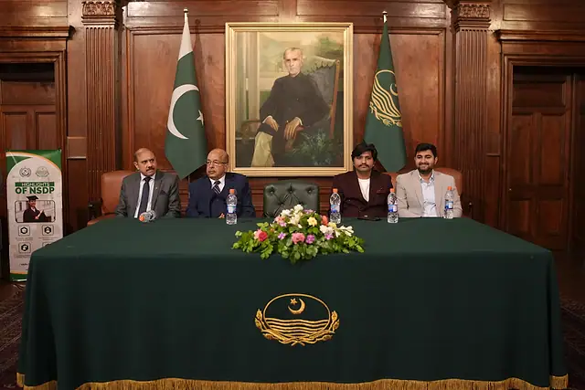 Guests seated at the stage table